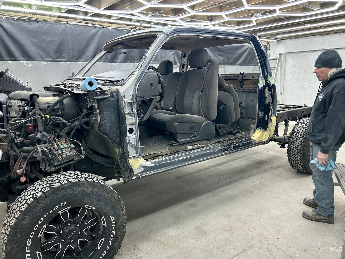 Truck stripped to the chassis in the shop